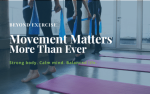 Adults participating in a small-group Pilates class using resistance bands to improve strength, balance, and mobility. The image highlights the Pilates & philosophy that movement supports healthy aging and lifelong wellbeing.